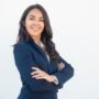 smiling-confident-businesswoman-posing-with-arms-folded